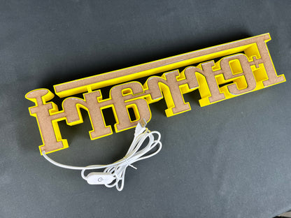 Insegna luminosa Ferrari scritta