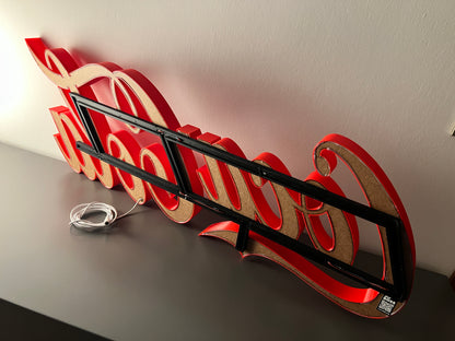 Insegna luminosa Coca Cola
