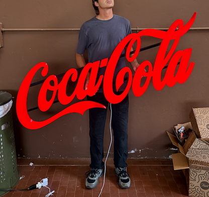 Insegna luminosa Coca Cola