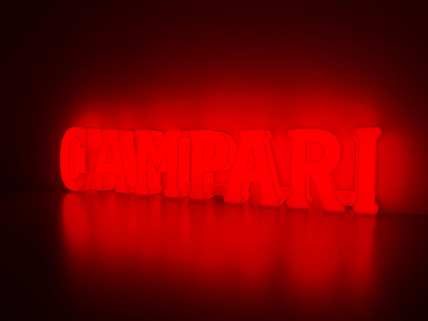 Illuminated Campari Soda written sign