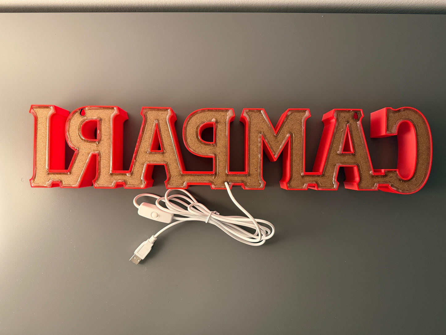 Illuminated Campari Soda written sign