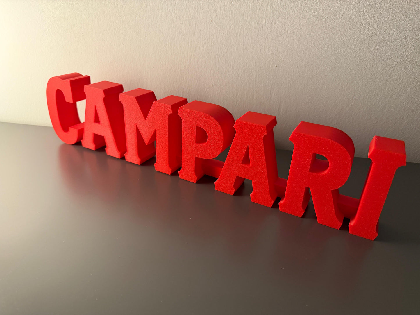 Illuminated Campari Soda written sign