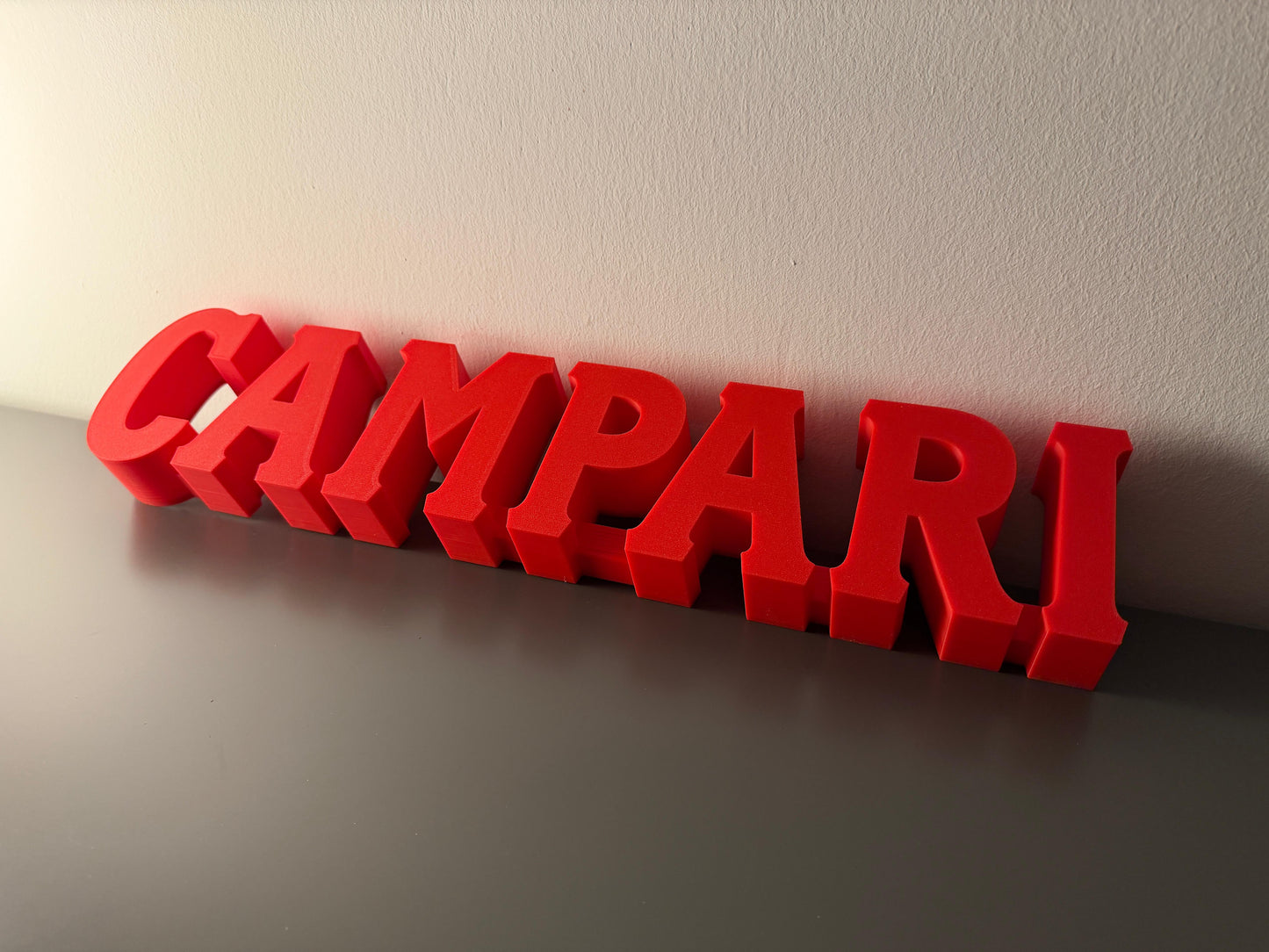 Illuminated Campari Soda written sign