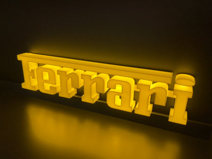 Insegna luminosa Ferrari scritta